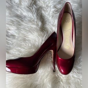 Joan and David lipstick red patent platform pumps